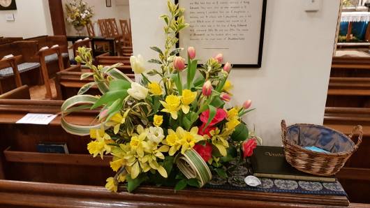 [Flowers arranged in church]