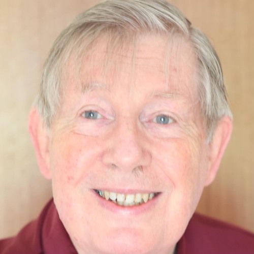 [Photo of Tim Ellis]